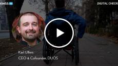 Karl Ulfers at DUOS_Wheelchair rider on sidewalk by FluxFactory / Creatas Video / Getty Images